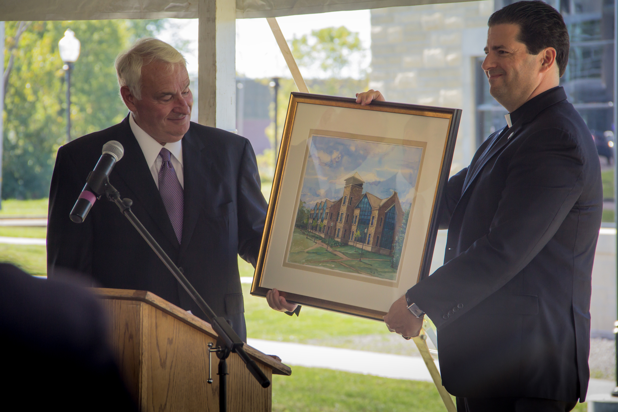 Tom Golisano presented with  rendering of new science building